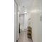 Simple bathroom with tiled floors, shower, a dark vanity providing practical functionality at 601 Retreat Beach Circle # 215, Pawleys Island, SC 29585