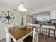 Cozy dining area next to the kitchen, complete with modern appliances and ample cabinet space at 601 Retreat Beach Circle # 215, Pawleys Island, SC 29585