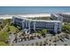 Beautiful oceanfront condo complex with palm tree landscaping and ample parking at 601 Retreat Beach Circle # 215, Pawleys Island, SC 29585