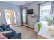 Inviting living space featuring a comfortable couch, desk, and view to the outside at 93 Weatherboard Ct., Pawleys Island, SC 29585