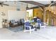 Covered outdoor space perfect for entertaining, with ceiling fans and stylish patio furniture at 93 Weatherboard Ct., Pawleys Island, SC 29585