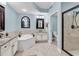 Stylish bathroom with soaking tub, walk-in shower, and elegant fixtures at 9547 Edgerton Dr. # 702, Myrtle Beach, SC 29572