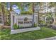 Elegant entrance sign for The Pointe community with manicured landscaping and lush greenery at 9547 Edgerton Dr. # 702, Myrtle Beach, SC 29572