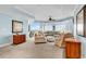 Bright living room with large windows, plush seating, and views of the outside at 9547 Edgerton Dr. # 702, Myrtle Beach, SC 29572