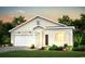 Rendering of a charming, newly constructed two-story home with a well-manicured lawn and attached garage at 1027 Laconic Dr., Myrtle Beach, SC 29588