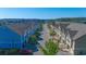 Aerial view down a street lined with well-maintained townhomes and garages at 105 Villa Mar Dr. # C-1, Myrtle Beach, SC 29579