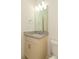 Stylish bathroom with a granite countertop vanity and a mirrored wall cabinet at 105 Villa Mar Dr. # C-1, Myrtle Beach, SC 29579