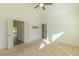 Cozy bedroom with convenient bathroom access, ceiling fan, and hall access at 105 Villa Mar Dr. # C-1, Myrtle Beach, SC 29579