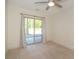 Bedroom featuring sliding glass doors to the patio and a ceiling fan at 105 Villa Mar Dr. # C-1, Myrtle Beach, SC 29579