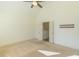 Neutral bedroom with vaulted ceiling, ceiling fan, and convenient hall access at 105 Villa Mar Dr. # C-1, Myrtle Beach, SC 29579