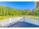 Enjoy the outdoors on this deck with views of the surrounding nature at 105 Villa Mar Dr. # C-1, Myrtle Beach, SC 29579