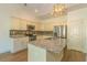 Stylish kitchen features granite countertops, stainless appliances, and ample cabinet space at 105 Villa Mar Dr. # C-1, Myrtle Beach, SC 29579
