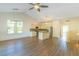 Open kitchen & living space with wood floors, island, and stainless steel appliances at 105 Villa Mar Dr. # C-1, Myrtle Beach, SC 29579