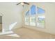 Bright main bedroom features large windows and plush carpeting at 105 Villa Mar Dr. # C-1, Myrtle Beach, SC 29579