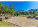 A well-maintained stone patio with outdoor seating and landscaping at 105 Villa Mar Dr. # C-1, Myrtle Beach, SC 29579