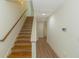 Elegant wooden staircase leading to the upper level of the home at 105 Villa Mar Dr. # C-1, Myrtle Beach, SC 29579