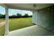 View of the backyard with a covered patio and grassy lawn at 1051 Laconic Dr., Myrtle Beach, SC 29588