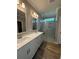 Modern bathroom featuring double sinks, a glass-enclosed shower, and contemporary fixtures at 1051 Laconic Dr., Myrtle Beach, SC 29588