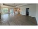 Spacious living room with hardwood floors, a ceiling fan, and an open floor plan at 1051 Laconic Dr., Myrtle Beach, SC 29588