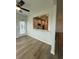 Open kitchen view featuring light wood floors, a door to the outside and white cabinets with recessed lighting at 1056 Laconic Dr., Myrtle Beach, SC 29588