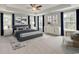 Spacious main bedroom with large windows, plush carpeting, and elegant decor at 1056 Laconic Dr., Myrtle Beach, SC 29588