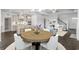 Open-concept dining area leading to a modern kitchen and living room, ideal for entertaining at 1059 Laconic Dr., Myrtle Beach, SC 29588