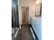 Bathroom featuring a glass enclosed shower, double vanity and a walk in closet at 1237 Lady Bird Way, North Myrtle Beach, SC 29582