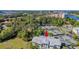 Overhead shot of a property showcasing its tennis courts and surrounding green landscape at 1313 Villa Marbella Ct. # 4-102, Myrtle Beach, SC 29572