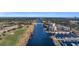 Coastal waterway view with a golf course, condo buildings, and a marina at 1313 Villa Marbella Ct. # 4-102, Myrtle Beach, SC 29572