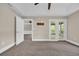 Bedroom with doors leading to more rooms and a screened in patio at 1313 Villa Marbella Ct. # 4-102, Myrtle Beach, SC 29572