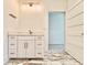 Elegant bathroom vanity with marble countertop, modern fixtures, and ample storage space at 133 Serenity Point Dr., Little River, SC 29566