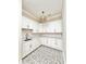 Well-appointed kitchenette featuring marble countertops, custom backsplash, and stylish pendant lighting at 133 Serenity Point Dr., Little River, SC 29566