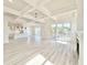 A bright living space with tray ceilings, fireplace, sliding glass doors, and an open layout at 133 Serenity Point Dr., Little River, SC 29566