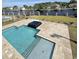 Aerial view of a stunning pool area with a nearby waterway at 133 Serenity Point Dr., Little River, SC 29566