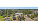 Panoramic aerial view of the neighborhood with tree lined streets and community pond at 233 Astoria Park Loop, Conway, SC 29526