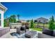 Backyard featuring a patio area with wicker furniture and a hot tub at 233 Astoria Park Loop, Conway, SC 29526