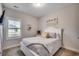 Cozy bedroom with neutral tones, natural light, and comfortable furnishings at 233 Astoria Park Loop, Conway, SC 29526