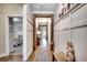 Hallway showcasing board and batten trim, wood floors, and decorative wood headers at 233 Astoria Park Loop, Conway, SC 29526