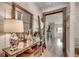 Charming hallway table with mirror, lamp and stylish decor at 233 Astoria Park Loop, Conway, SC 29526