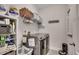 Efficient laundry room with modern washer/dryer and ample storage space at 233 Astoria Park Loop, Conway, SC 29526