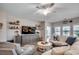 Bright living room boasting modern decor, hardwood floors, and entertainment center at 233 Astoria Park Loop, Conway, SC 29526