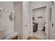 Convenient mud room featuring bench, coat hooks, and access to the laundry room at 233 Astoria Park Loop, Conway, SC 29526