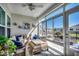 Cozy sunroom with lots of natural light and comfortable seating at 233 Astoria Park Loop, Conway, SC 29526