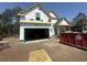 A new home under construction features a two-car garage at 2611 Painted Trillium Ct., Myrtle Beach, SC 29579