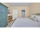 Comfortable bedroom featuring a bed, cabinet, and a bathroom through a doorway at 2771 Eclipse Dr., Myrtle Beach, SC 29577