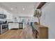 Bright kitchen with stainless steel appliances, granite countertops, and an open view to the living area at 2771 Eclipse Dr., Myrtle Beach, SC 29577