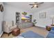 Cozy living room offers a comfortable chair, decorative wall art, and a large media center at 2771 Eclipse Dr., Myrtle Beach, SC 29577
