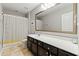 Bathroom featuring a shower with a striped shower curtain, a single vanity, and tile floor at 3110 Bramble Glen Dr., Myrtle Beach, SC 29579