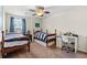 Bedroom featuring two twin beds, ceiling fan, and light-colored carpet at 3110 Bramble Glen Dr., Myrtle Beach, SC 29579