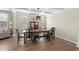 Open dining area featuring a stylish light fixture and natural light, creating an inviting ambiance at 3110 Bramble Glen Dr., Myrtle Beach, SC 29579